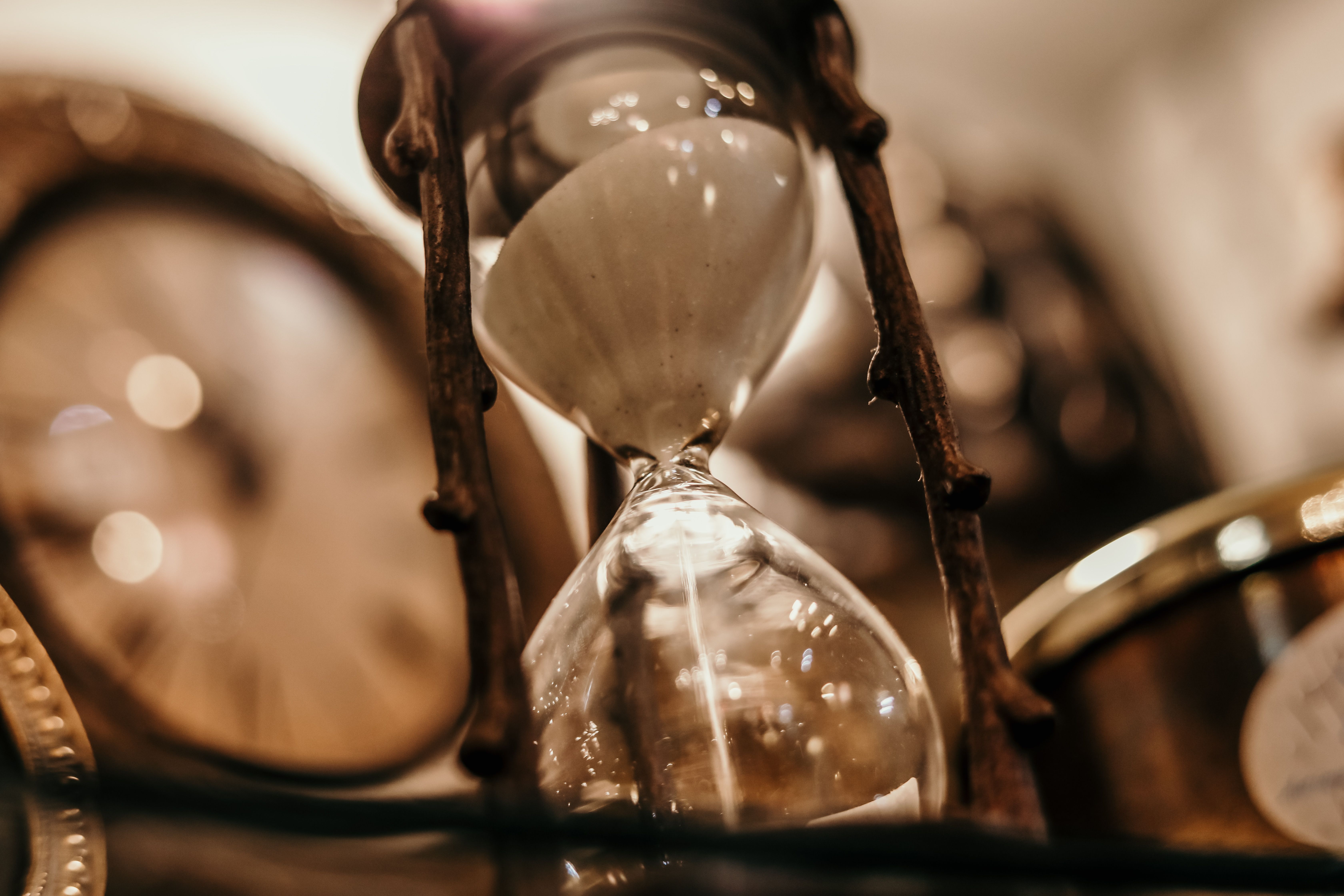 An hourglass with sand running through it